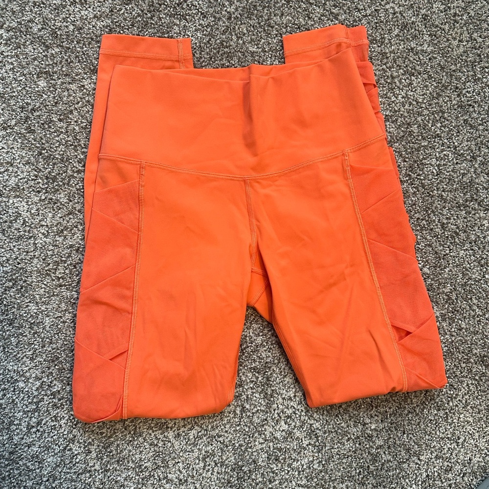 Lululemon criss cross Orange Leggings 6